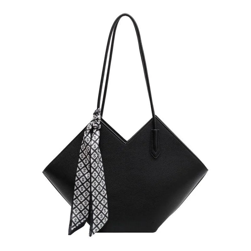 Women's large capacity shoulder bag in PU leather showing horizontal square shape and shoulder strap