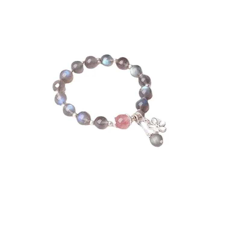 925 sterling silver honeysuckle bracelet with moonlight lime and strawberry crystals on wrist