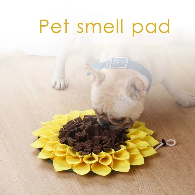 Yellow sunflower shaped dog snuffle mat with fleece petals for hiding treats during nosework training