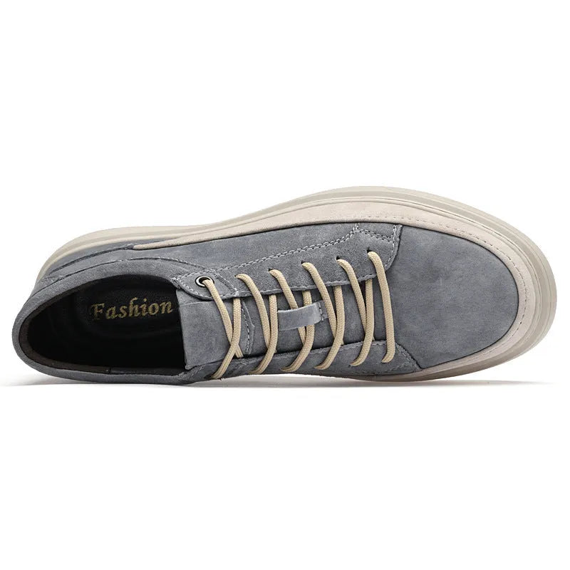 Men's grey pigskin leather casual skate shoes with a flat rubber sole and lace-up front.