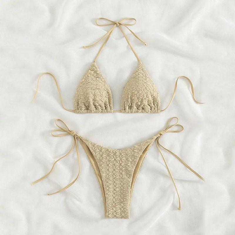 Women's khaki high waist bikini swimsuit with lace-up front and matching shorts laid flat.