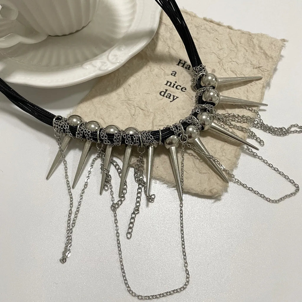 Leather winding tassel necklace with round beads and rivet accents for women