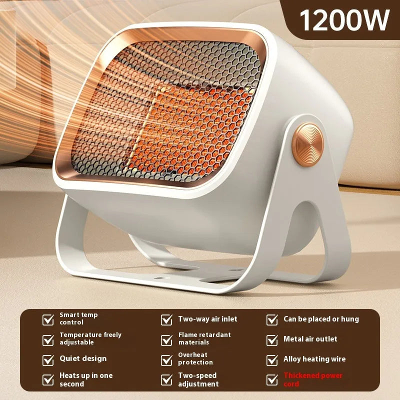 White desktop ceramic heater with rotating base and push-button controls on a wooden desk.