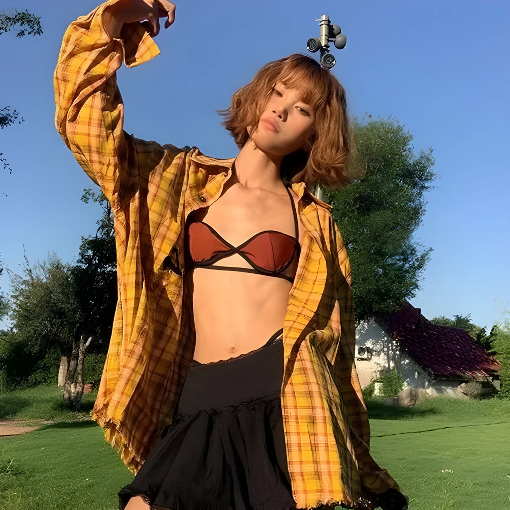 Dopamine yellow plaid loose fit shirt on hanger showing cardigan style and chemical fibre blend fabric