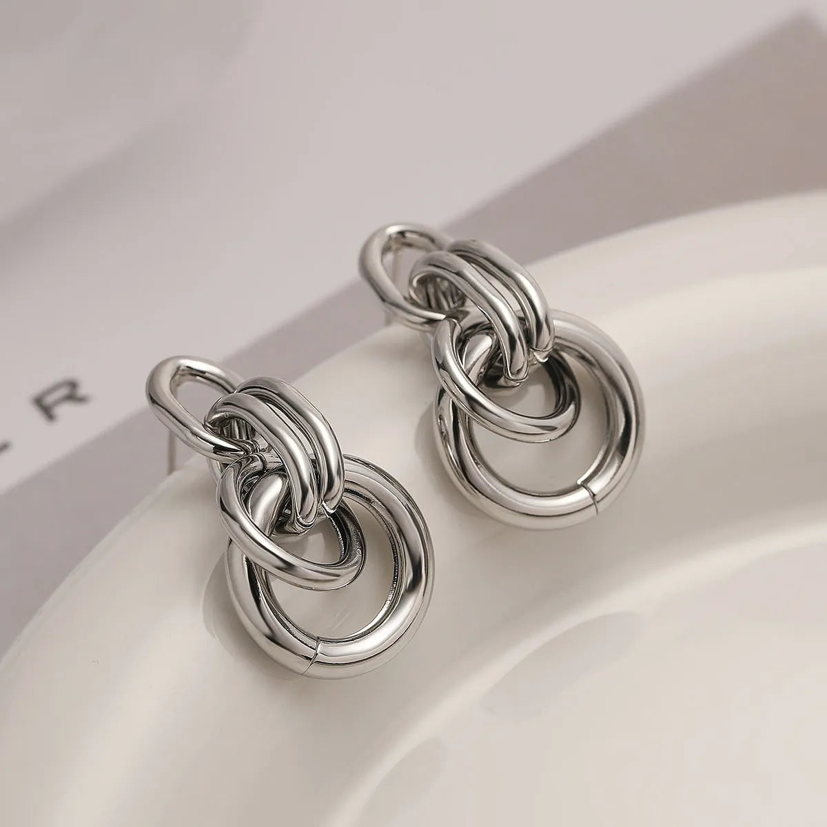 Women's gold geometric earrings with an irregular shape and high-profile INS design.