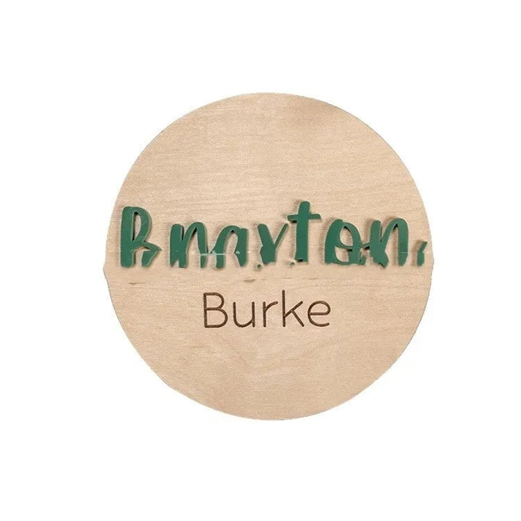 Brown limewood baby birth announcement board in a modern art style, available in sizes from 102mm to 203mm.