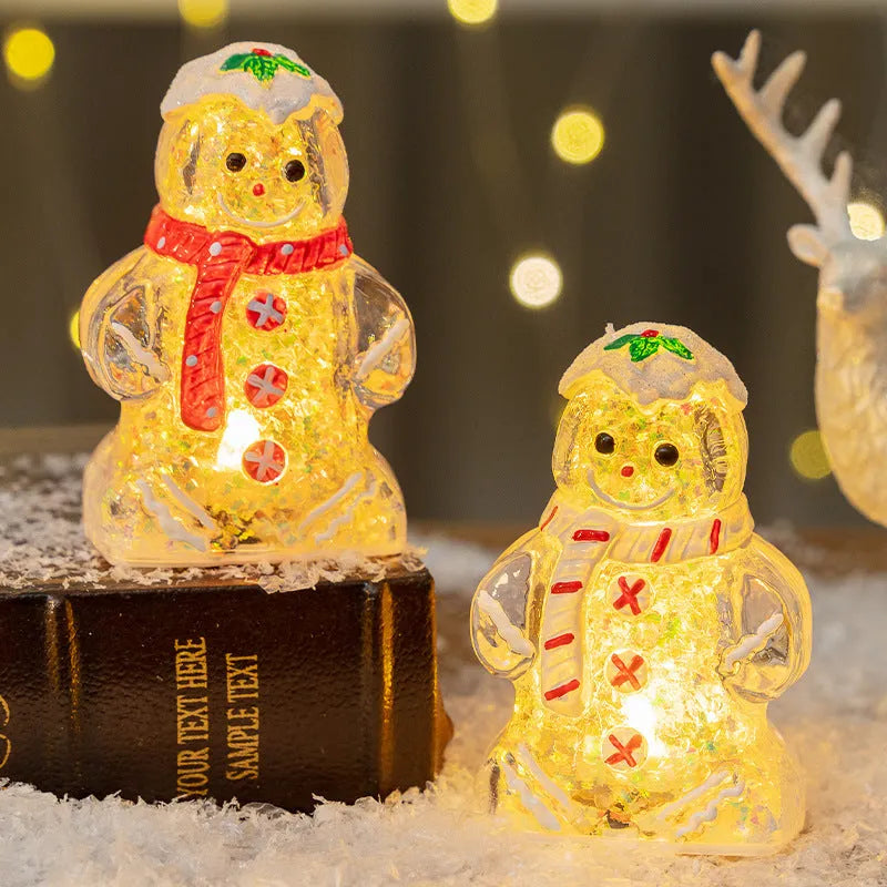 Glowing plastic gingerbread man and snowman Christmas tree ornament with coloured scarf