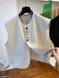 Beige loose-fitting short waistcoat dress with a chest pocket on a hanger.