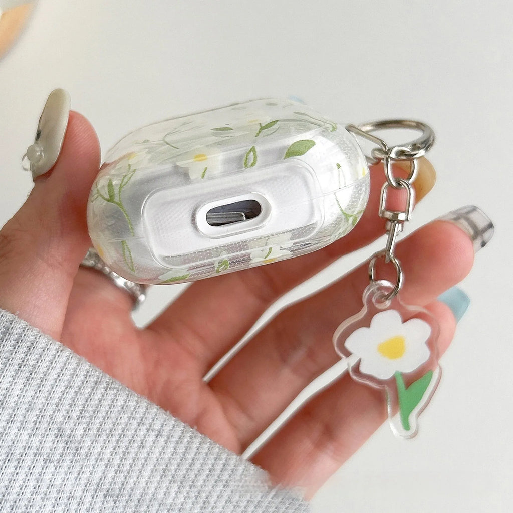 White floral decorative pattern on a high transparency TPU protective case for Apple AirPods.