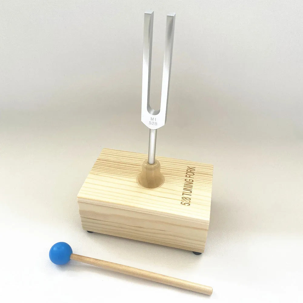 Aluminium alloy tuning fork with portable speaker for sound therapy sessions