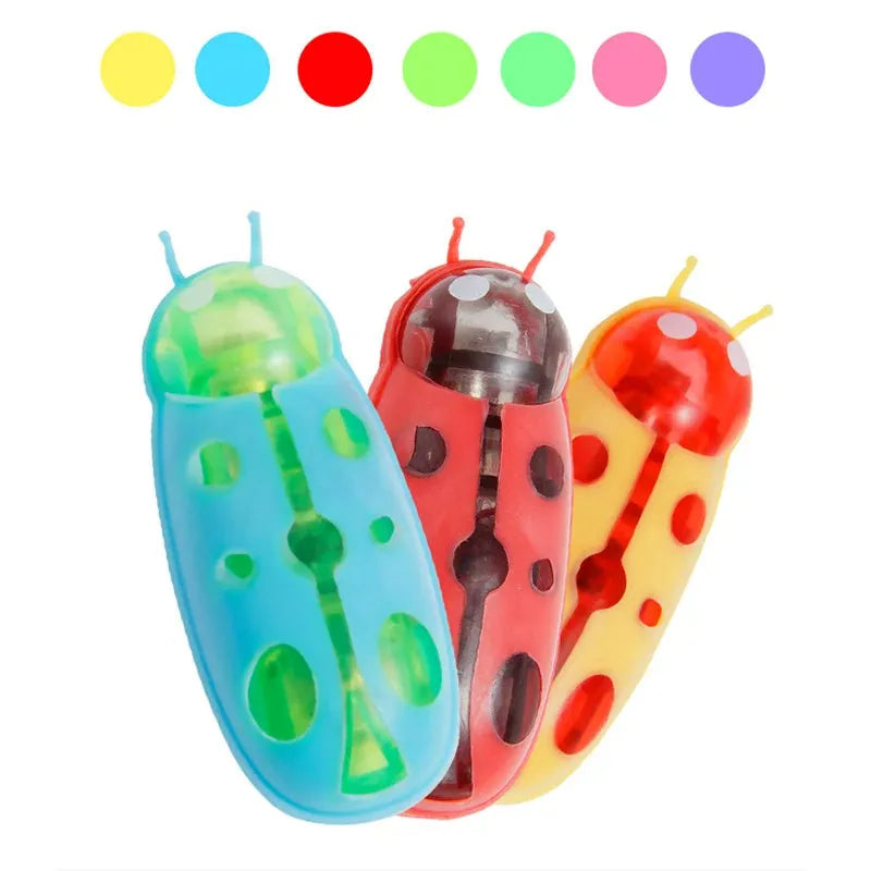 Mini electric ladybug cat toy crawling on surface with 12 angular legs visible