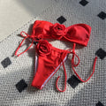 Women's rose tube top swimsuit with drawstring straps in light purple, shown with briefs-style bottom.