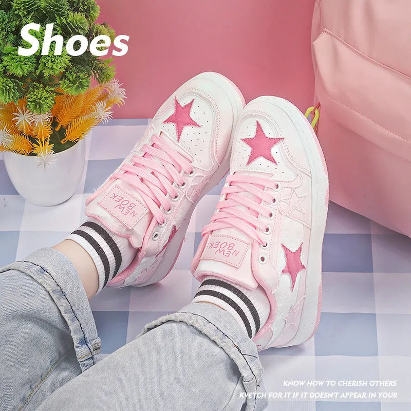Minority denim skateboard shoes in black, green, and pink colours with rubber sole and lace-up front.