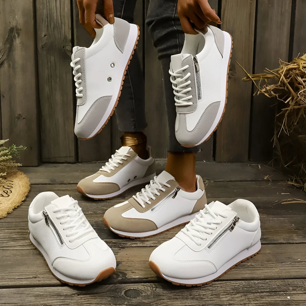 Women's flat-heeled shoes in artificial PU with rubber sole, available in grey, white, and champagne colours