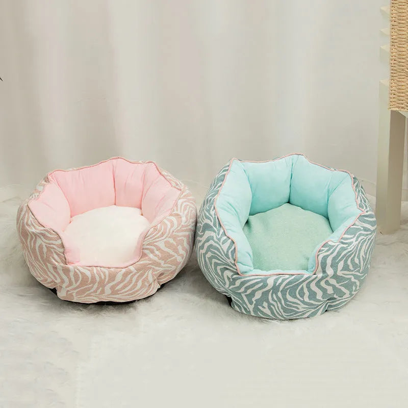 Blue octagonal pet bed with high sides, soft interior, and a removable mat for a cat or small dog.