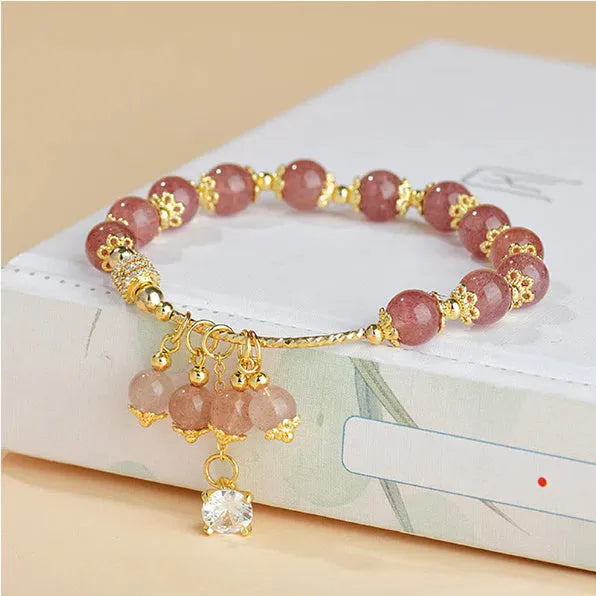Pink crystal women's bracelet with heart-shaped strawberry quartz beads and natural pearl accents