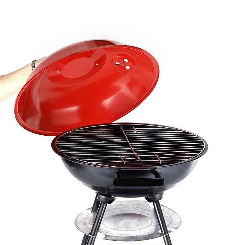Portable iron barbecue grill with a 14-inch apple stove design for outdoor cooking.