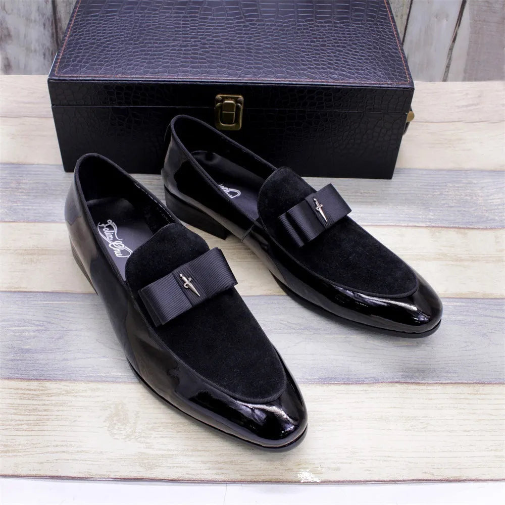 Men's low-top leather shoes in black with patent leather finish and a tassel detail.