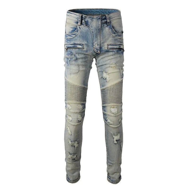 Light blue men's slim fit distressed jeans with hand-frayed details on a mid waist, showing a light straight leg cut.