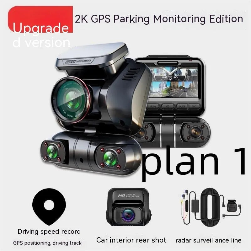 Plastic multi-lens car dash cam with a 2-inch screen on a car dashboard.