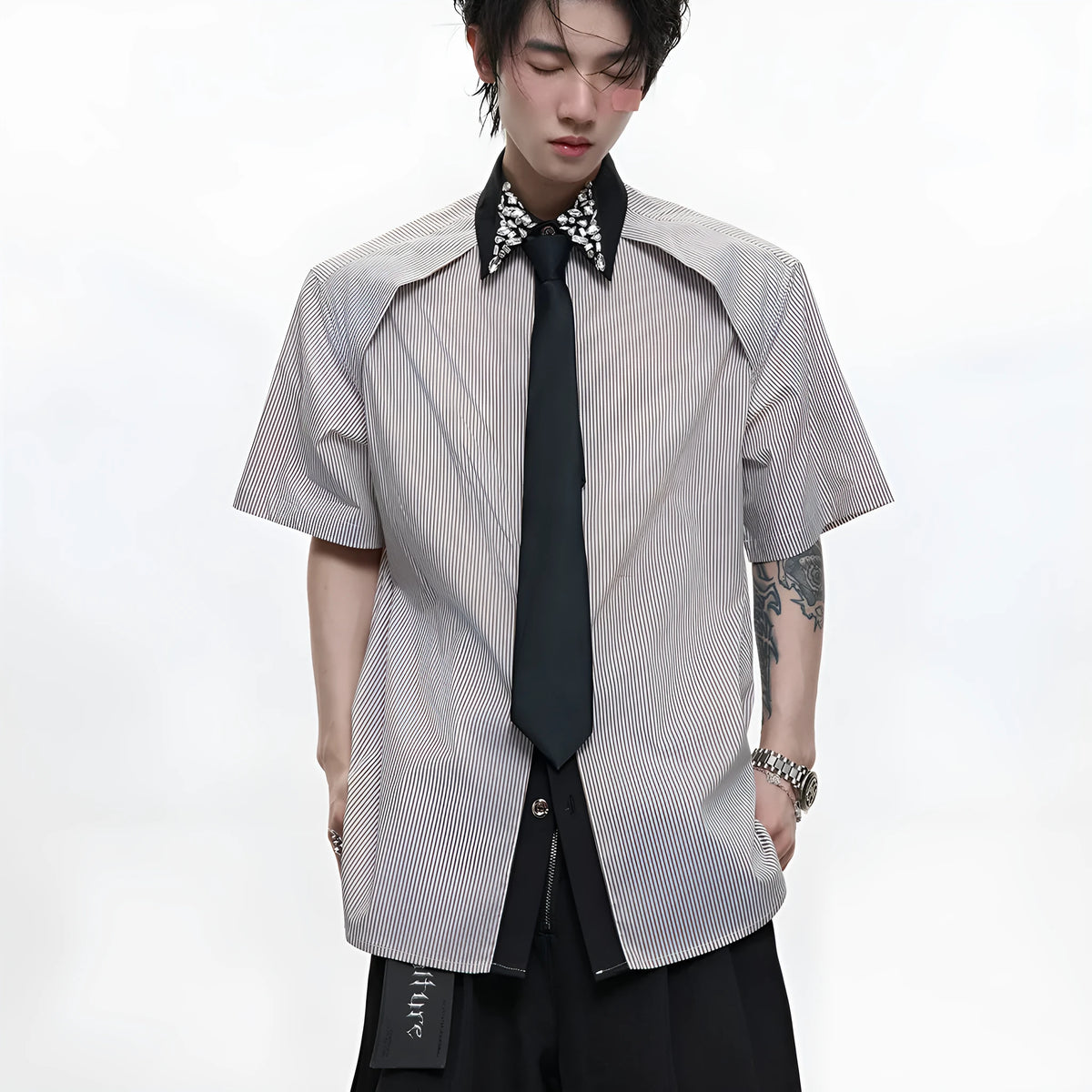 Men's blue and khaki patchwork striped shirt with quilted panels and a flip collar