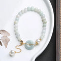 Natural emerald peace buckle pearl bracelet with jade round pendant and geometric national style design