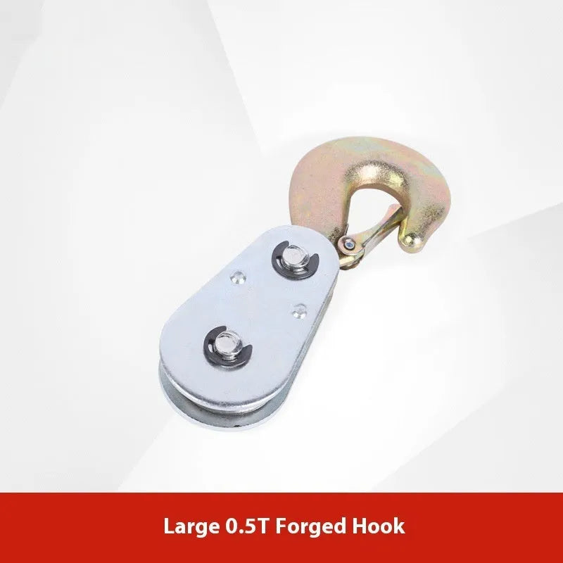Red single sheave industrial lifting pulley with ring hook and safety latch.