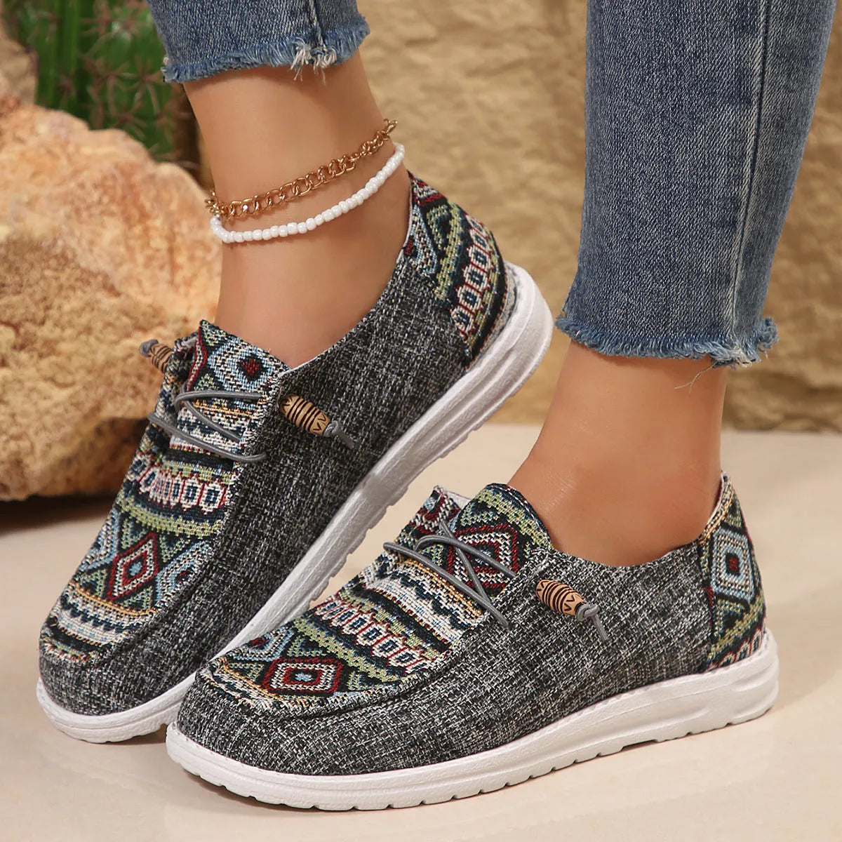 Women's flat slip-on shoes with round toe design in black, dark grey, or khaki colours