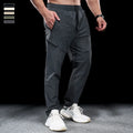 Men's waterproof quick-drying exercise trousers in nylon fabric for sports and fitness