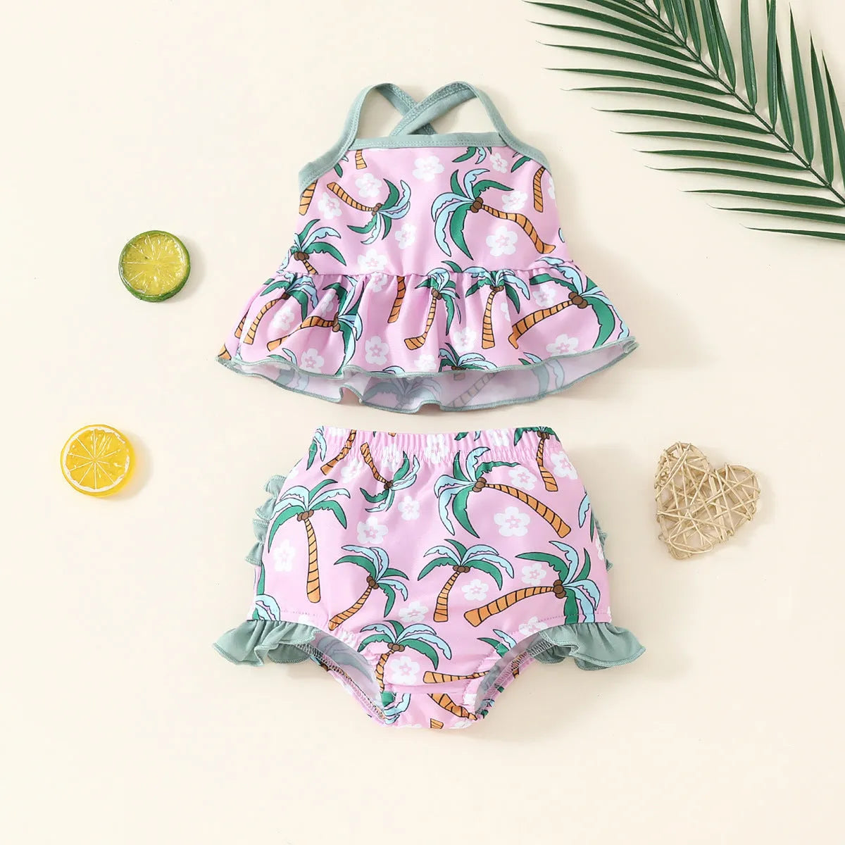 White children's two-piece swimsuit set with top and beach shorts for toddlers