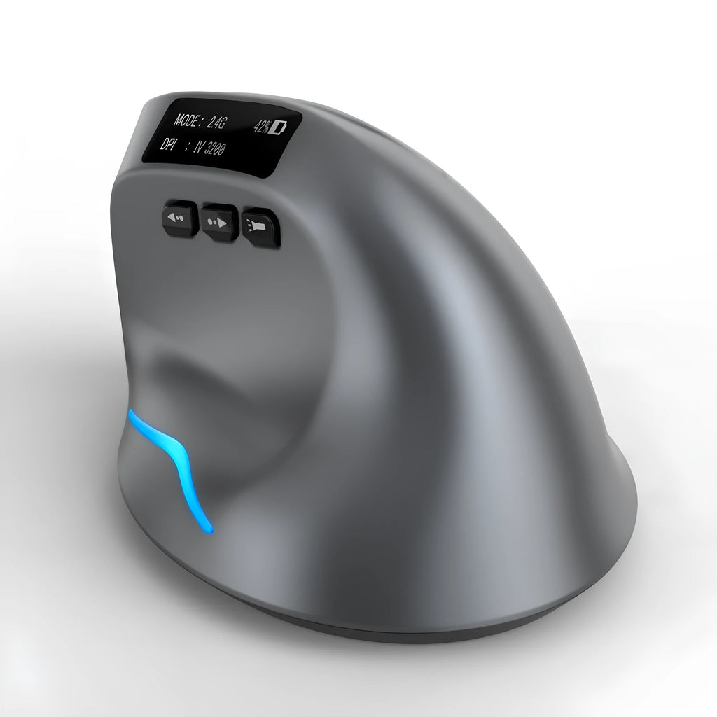 Grey handheld Bluetooth vertical mouse on a desk next to a laptop.