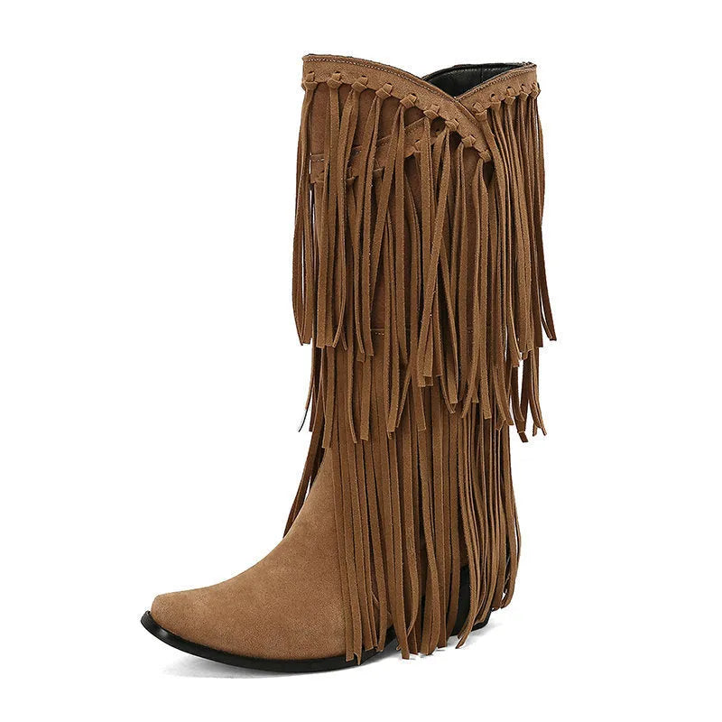 Women's beige suede high boots with tassel detail, chunky heel, and square toe on a waterproof platform sole.
