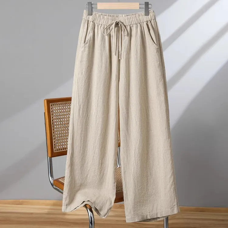 Women's straight-leg casual trousers with elastic waistband and lace-up drawstring detail in four colour options