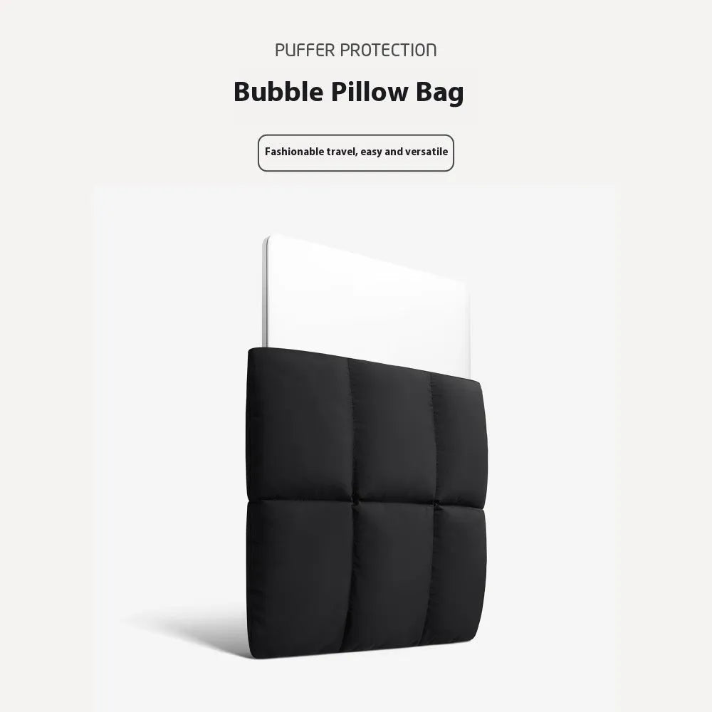 Soft fluffy black laptop sleeve with sewing thread details for 13 to 15.6 inch devices.