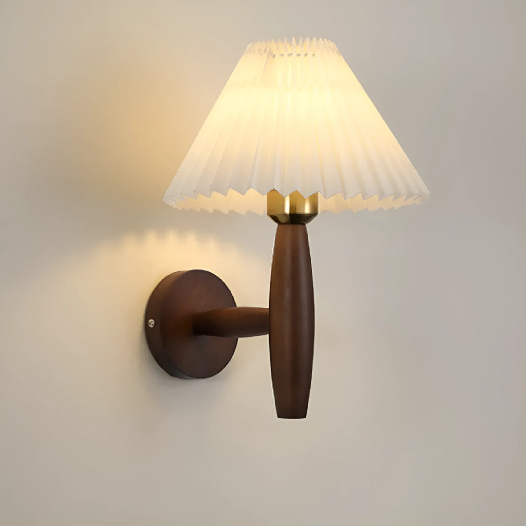 Walnut wood and copper American retro wall lamp with fabric shade on a wall.