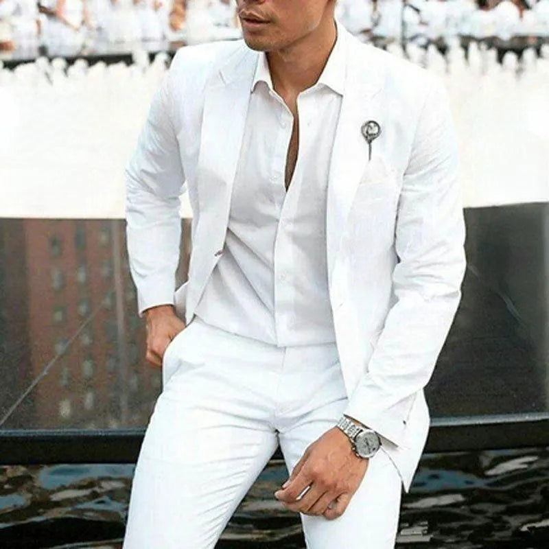 Men's white slim-fit two-piece suit on a hanger, suitable for weddings and business.