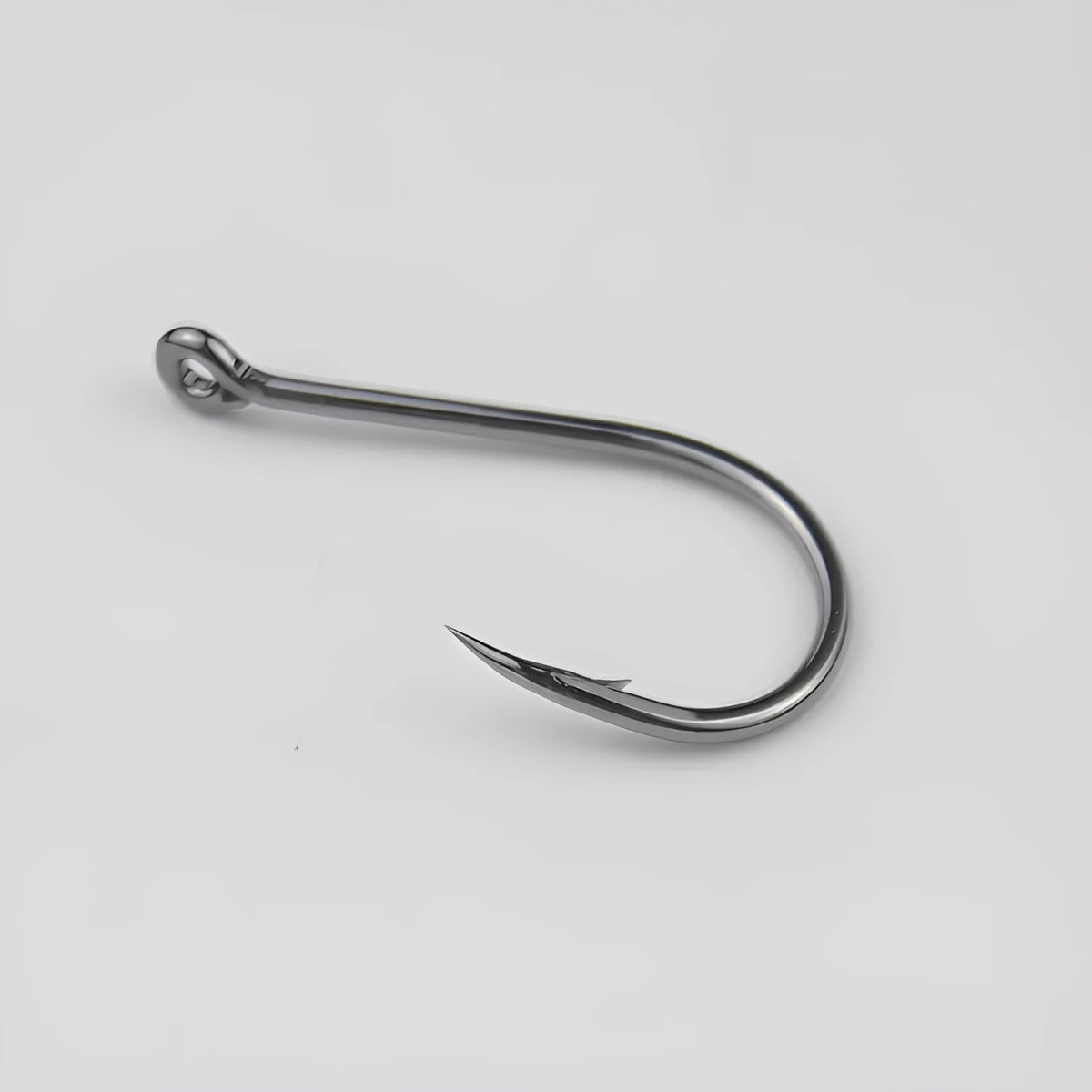 Bulk pack of barbed fishing hooks with crooked mouth and hole ring, made from alloy carbon steel.