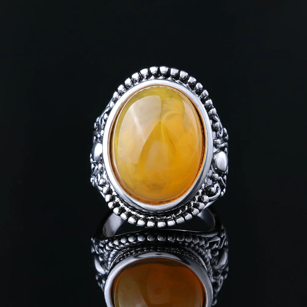 Geometric fluorescent beeswax alloy electroplated ring in antique silver amber colour