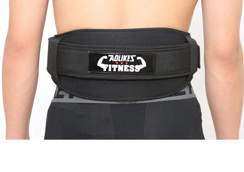 Nylon fitness weightlifting belt for adults on a gym floor, shown in black, red, and yellow colour options.