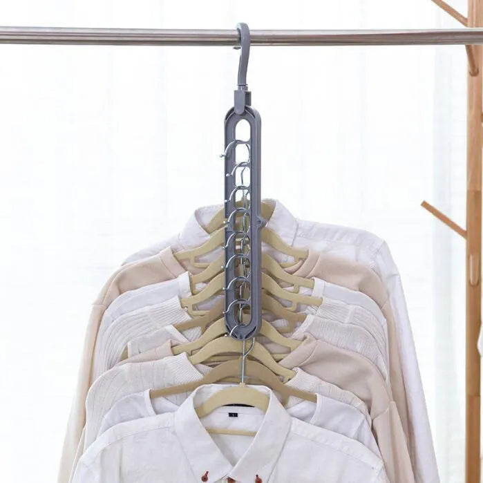 Plastic clothes hanger with rotating hook in pink or green colour for heavy garment storage