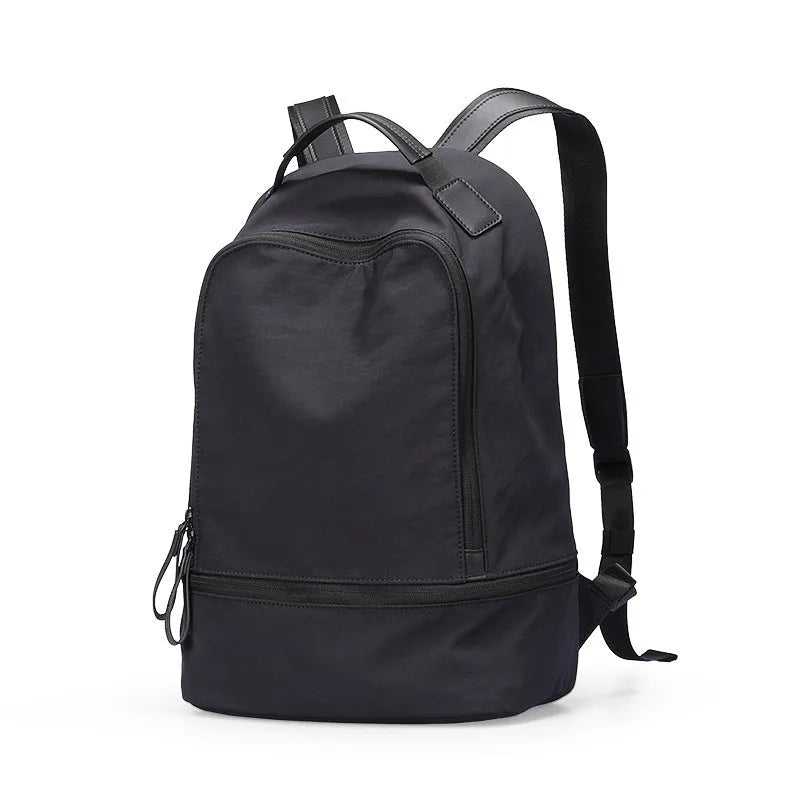 Lightweight Oxford cloth backpack in solid colour with 20L capacity for travel and commuter use