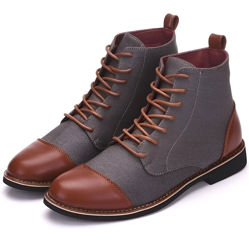 Men's black leather motorcycle boots with belt buckle detail and rubber sole.