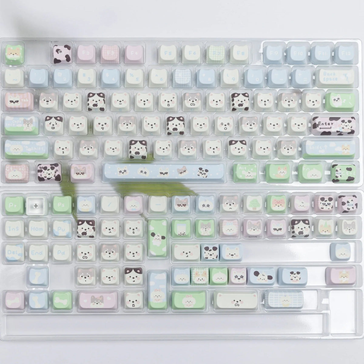 Full set of PBT keycaps with colourful sublimated cat and puppy designs for a mechanical keyboard.