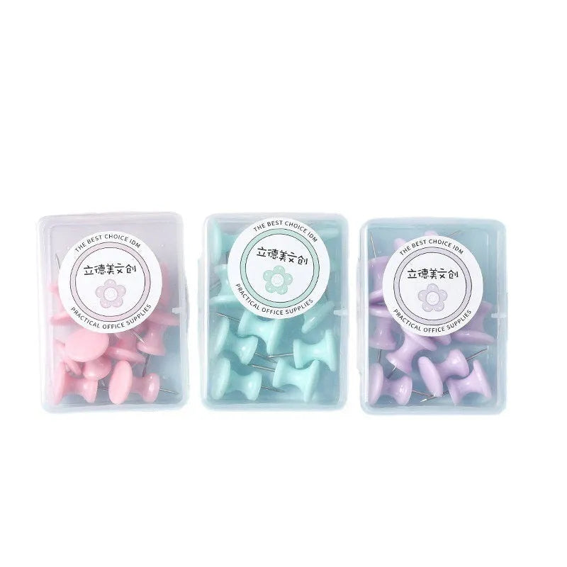 Box of macaron colour plastic push pins showing large and small sizes in cherry blossom pink, mint green, and lavender.