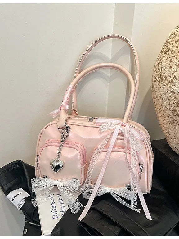Women's soft PU leather shoulder bag in horizontal square shape with phone compartment.