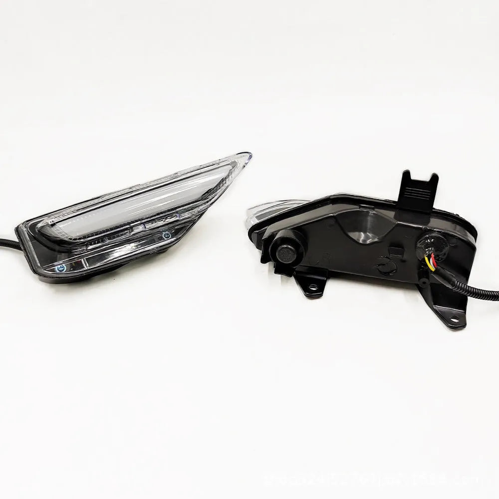Infiniti Q50 Q70 front bumper LED turn signal and daytime running lamp assembly with ABS housing.