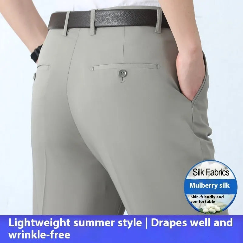 Men's straight-leg high-waist trousers in a mulberry silk blend fabric, shown in dark blue.