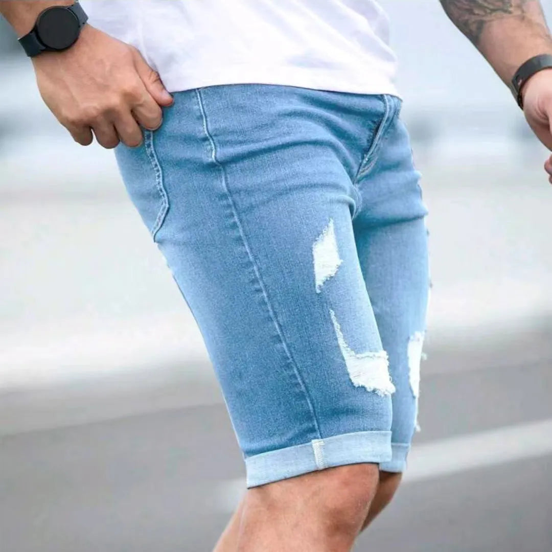 Men's sky blue denim shorts with multi-hole distressed design, low waist straight cut silhouette
