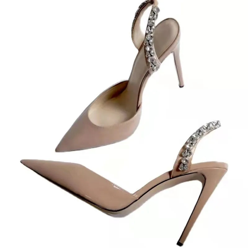 Women's black patent leather pointed-toe high heel sandals with side rhinestone detailing on an 11cm heel.