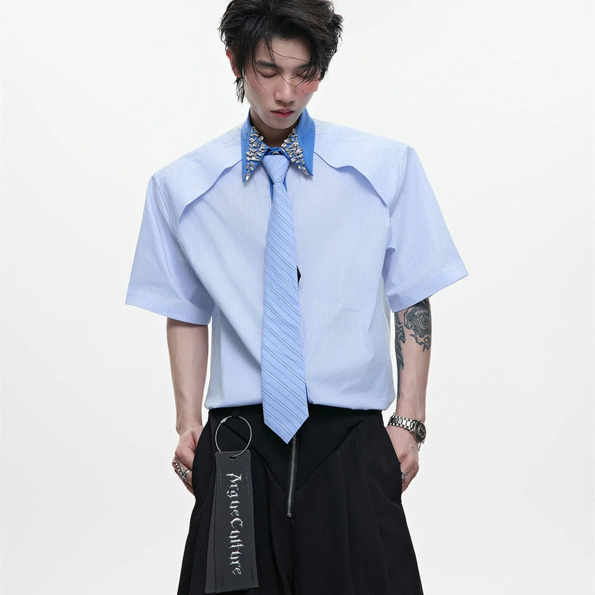 Men's blue and khaki patchwork striped shirt with quilted panels and a flip collar